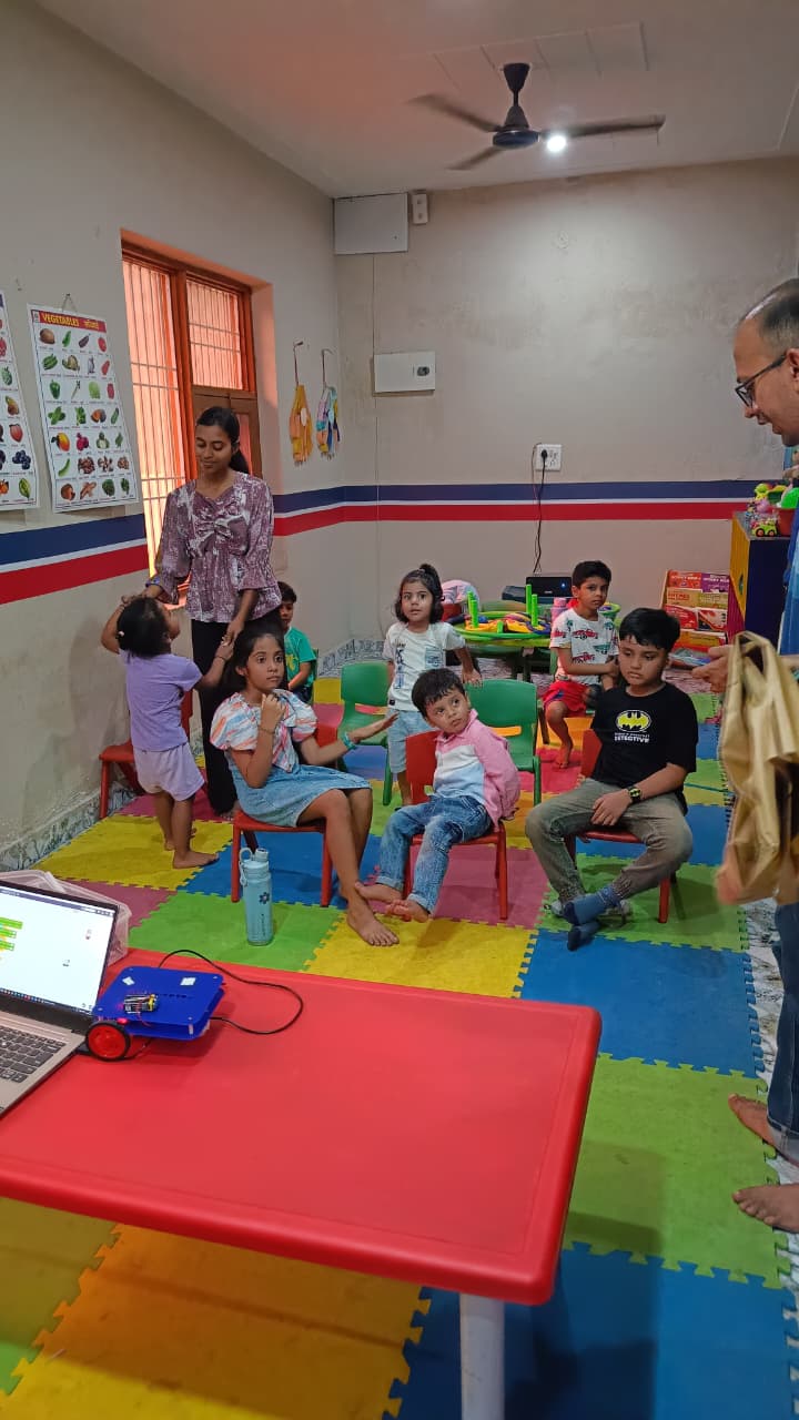 Students showing robotic creations